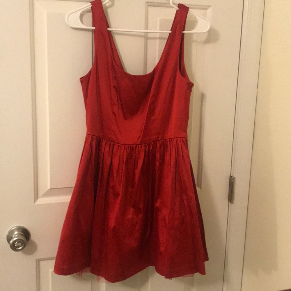 red tulle dress with bow in back